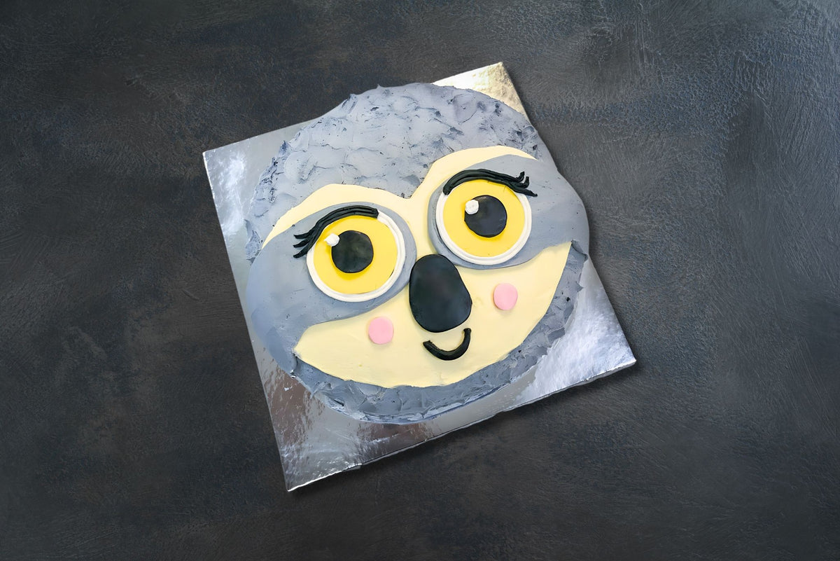 girl-sloth-face-cake