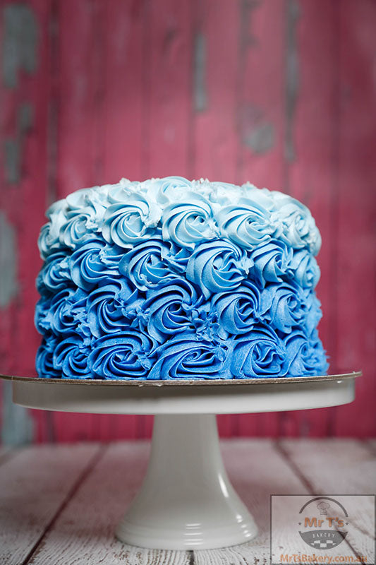 Wilton Blue in a Blur 5-Layer Cake | Cake, Swirl cake, Moist cake recipe